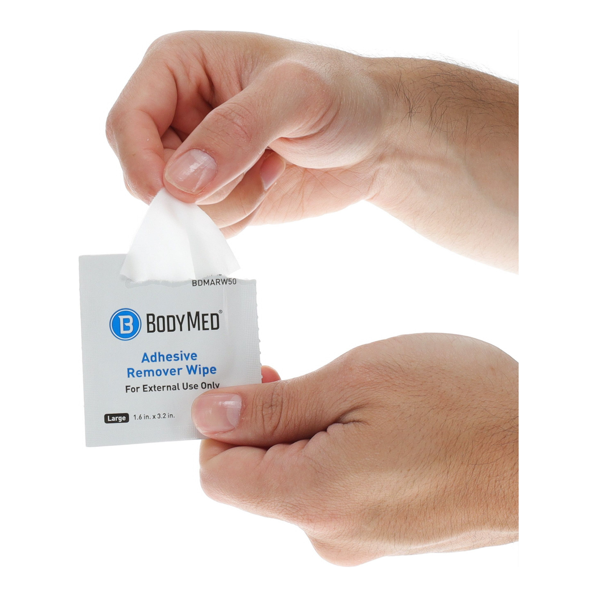 BodyMed Adhesive Remover Wipe being removed from its packet